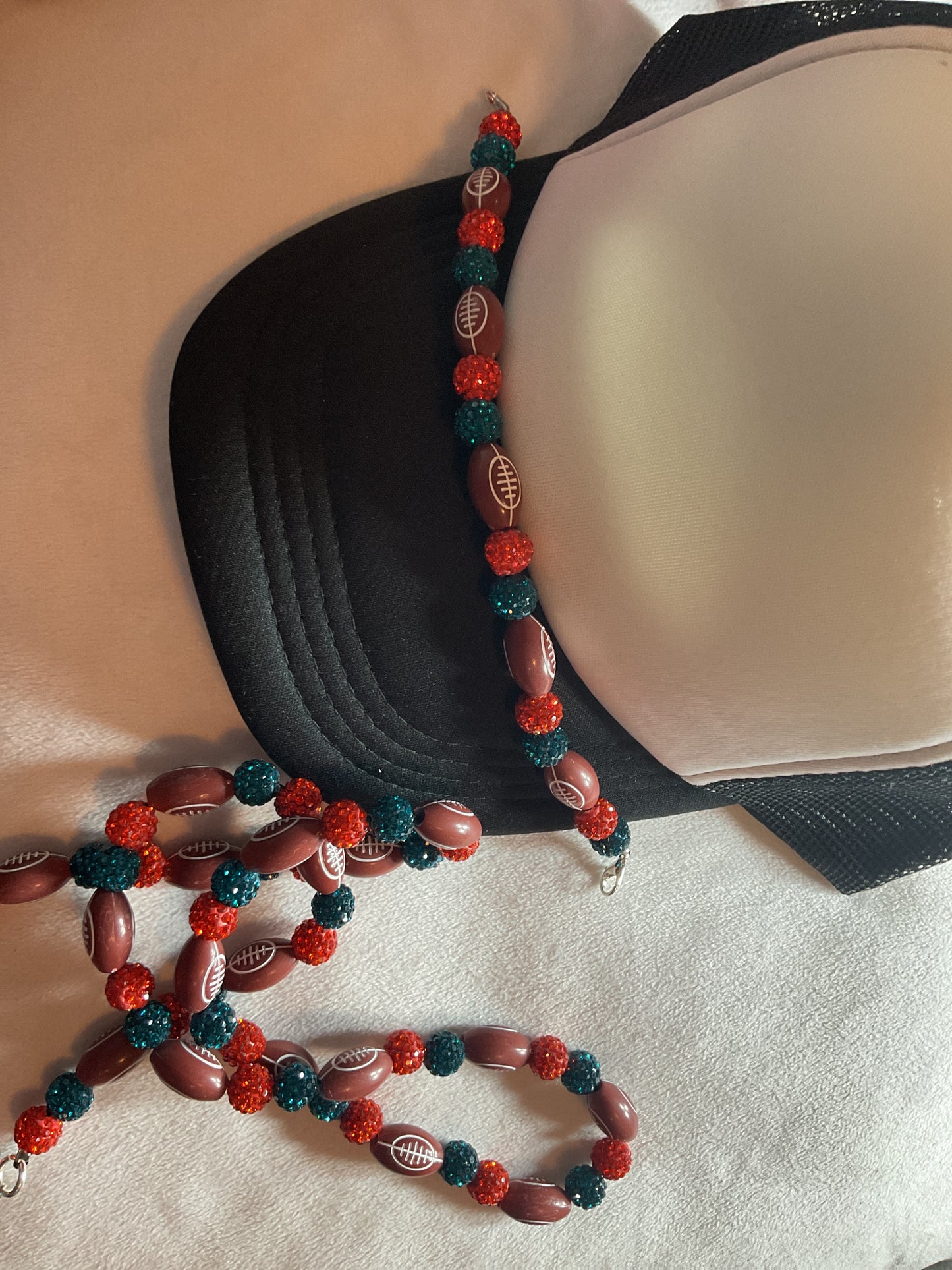 Trucker Hat: Accessories “Sports team color necklace and trucker hat chain. (example pictured)