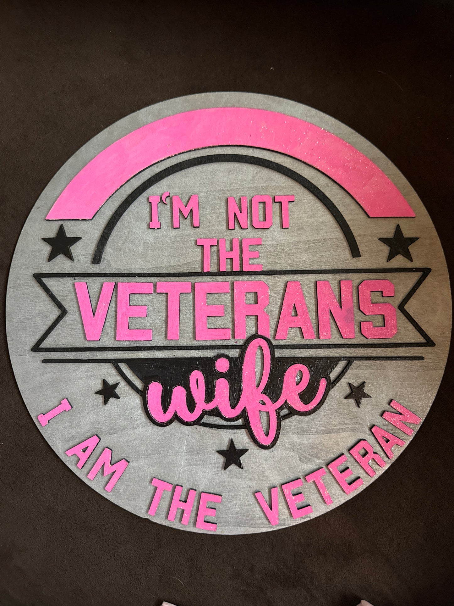 Laser engraved with "I’m not the veteran's wife; I am the veteran" sign